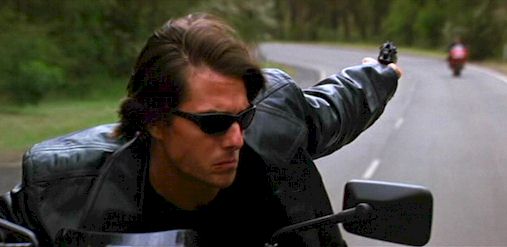 tom cruise mission impossible. Tom Cruise deals with a pesky fan in Mission: Impossible 2.