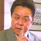Bill Tung in Police Story 2 (1988)