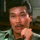 Melvin Wong in Yes, Madam! (1985)