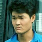 Michael Chow in Inspectors Wear Skirts (1988)