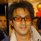 Ken Wong wearing some really hideous shades